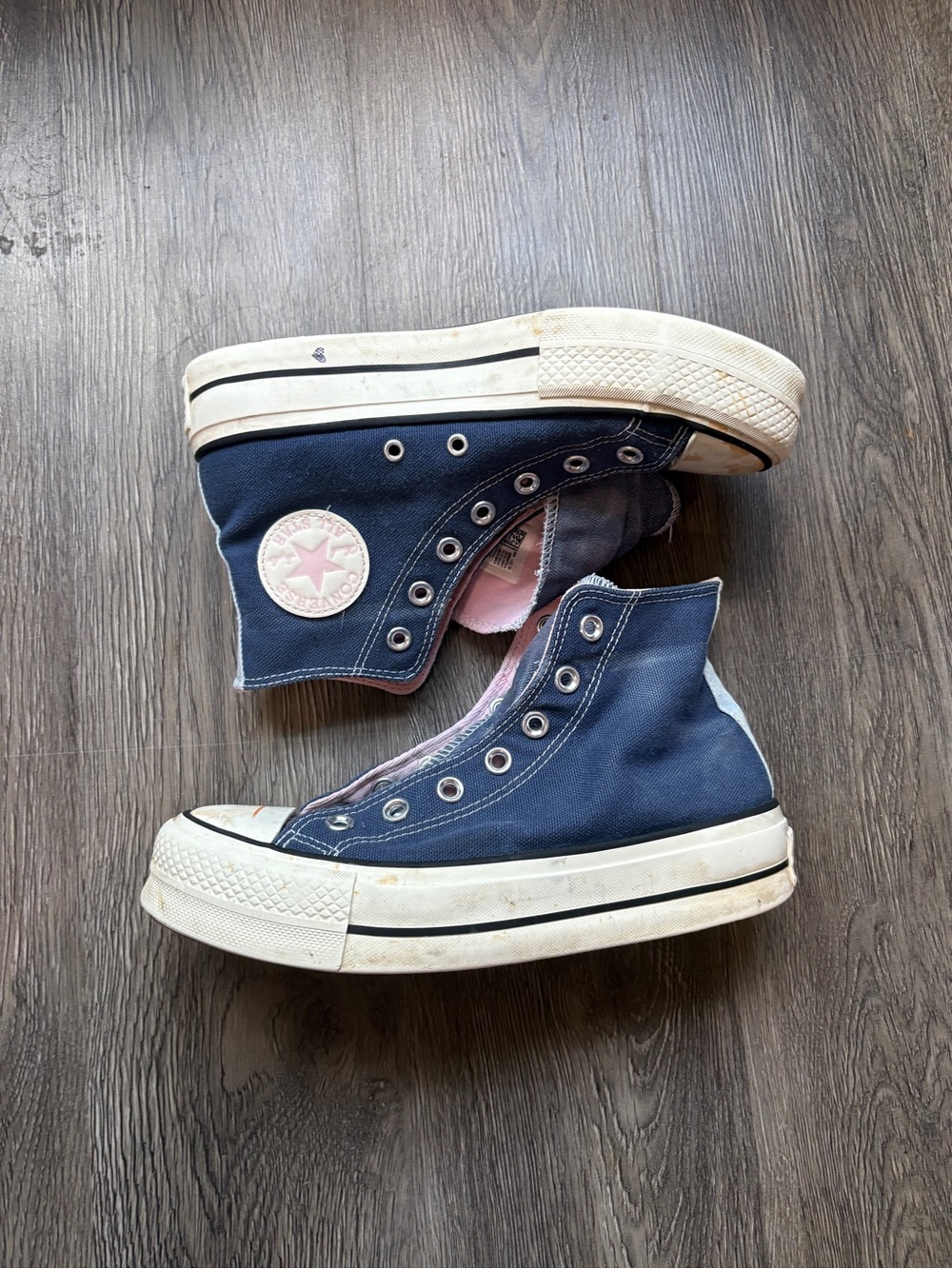 Converse Chuck Taylor High Top Sneakers in Navy with Pink Patch